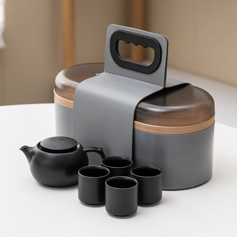 Bộ ấm trà du lịch trọn Bộ gốm sứ cắm trại ngoài trời cốc khách nhanh một ấm bốn cốc ấm trà Kung Fu quà tặng doanh nghiệp