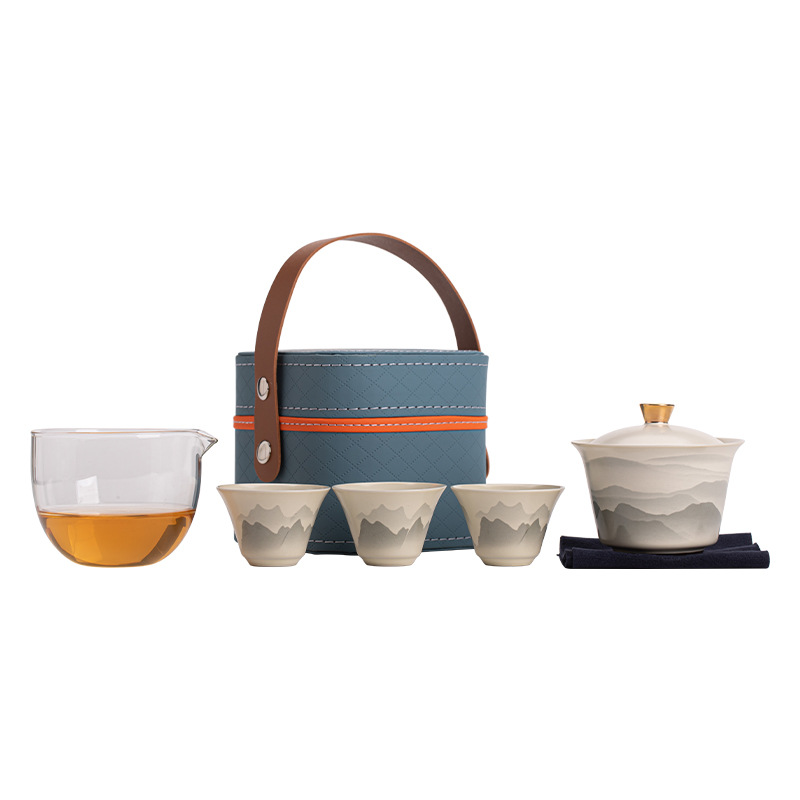 Bộ trà du lịch đựng gốm sứ cầm tay cốc khách nhanh một ấm bốn cốc cắm trại ngoài trời cốc trà Kung Fu ấm pha trà