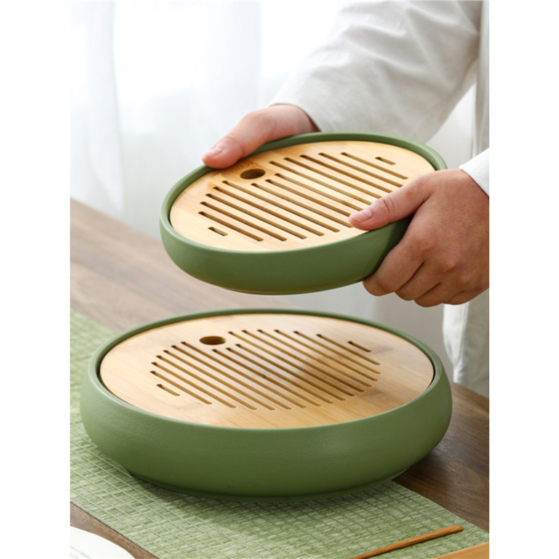 Khay trà gốm sứ pha khô gia dụng cao cấp tinh tế giá trị cao phong cách Trung Quốc mới cổ điển hình tròn sáng tạo khay trà trữ nước bán buôn