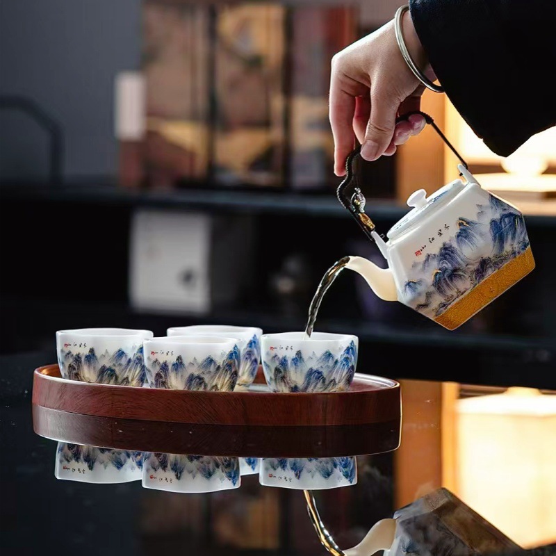 Qianli Jiangshan Kung Fu Bộ trà underglaze màu chịu nhiệt độ cao công suất lớn ấm trà gốm khay trà du lịch bộ trà sang trọng quà tặng