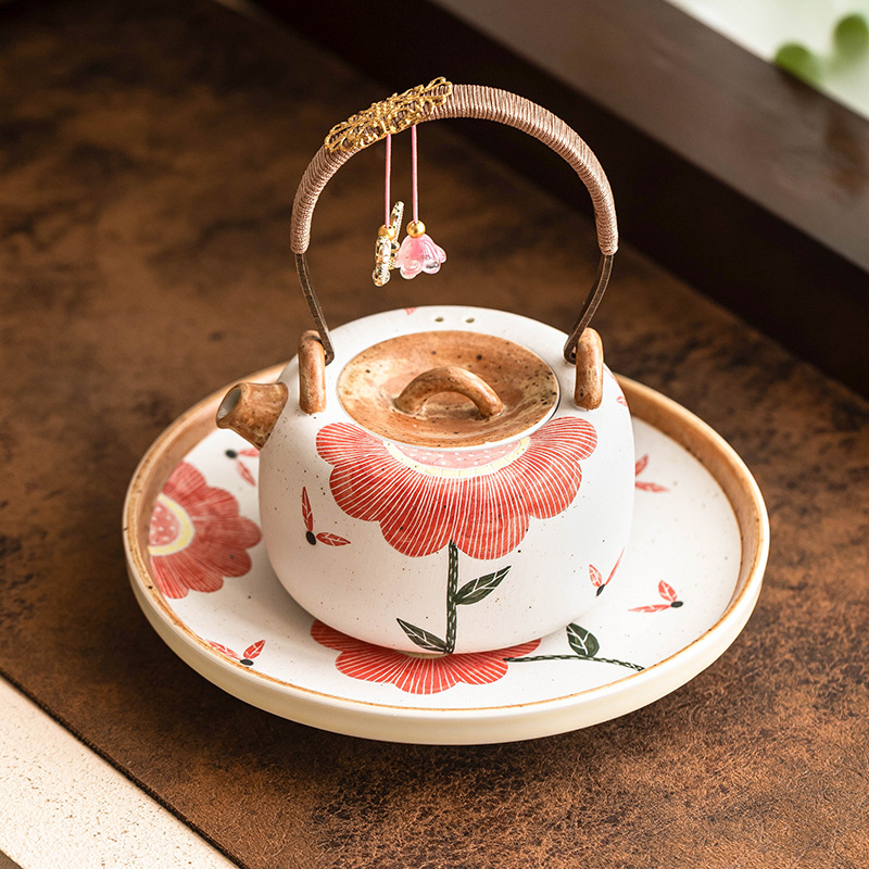 Ấm trà gốm sứ ấm trà hoa hướng dương chạm khắc màu hồng ấm trà trà lọc chống bỏng một ấm trà đĩa pha khô ấm ấm trà tấm lót ấm trà