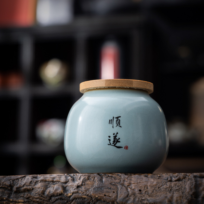 Hộp đựng trà gốm sứ nhỏ Tianqingru lò mở miếng kín hộp đựng trà gia dụng hộp đựng trà xanh trà Pu'er