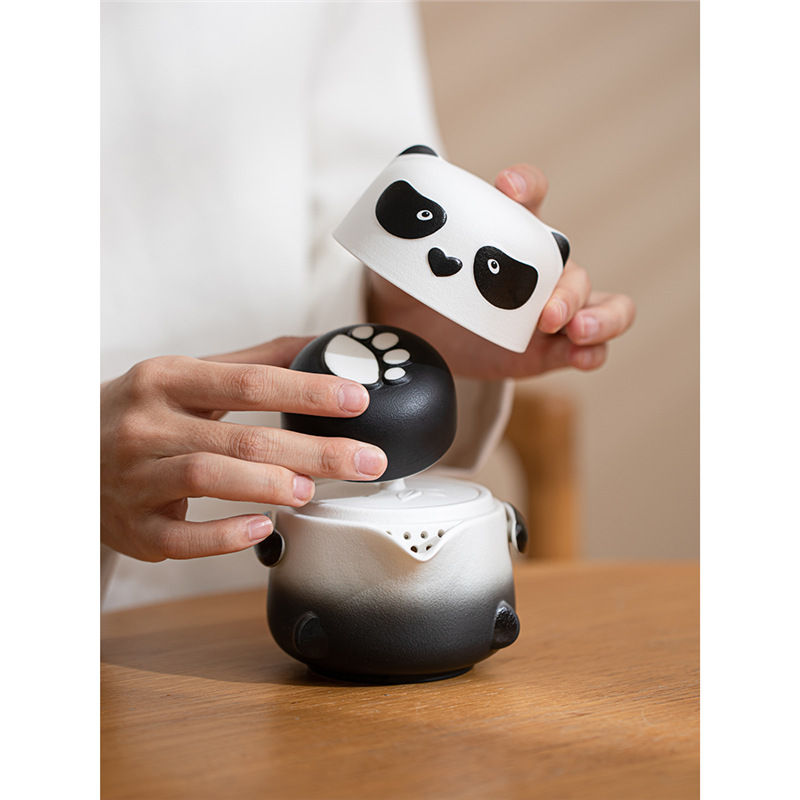 Bộ trà Kung Fu gốm sứ một bình hai cốc cầm tay ngoài trời Panda Kuai Ke thiết bị uống trà túi du lịch