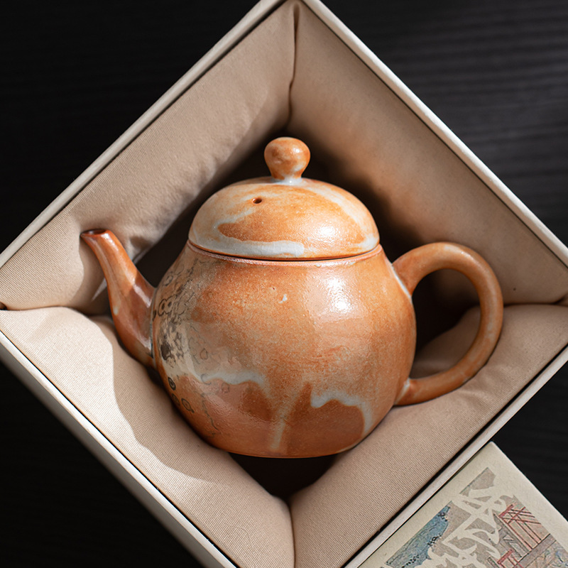 Shino-yaki hình quả lê ấm trà retro kung fu bộ trà hộ gia đình lò quay gốm bóng lỗ lọc ấm trà nồi đơn hộp quà tặng