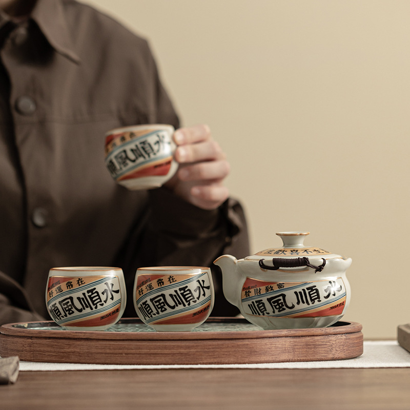 Bộ ấm trà du lịch một ấm ba cốc có thể nâng cốc trà lò Ru cổ cầm tay ấm trà cầm tay