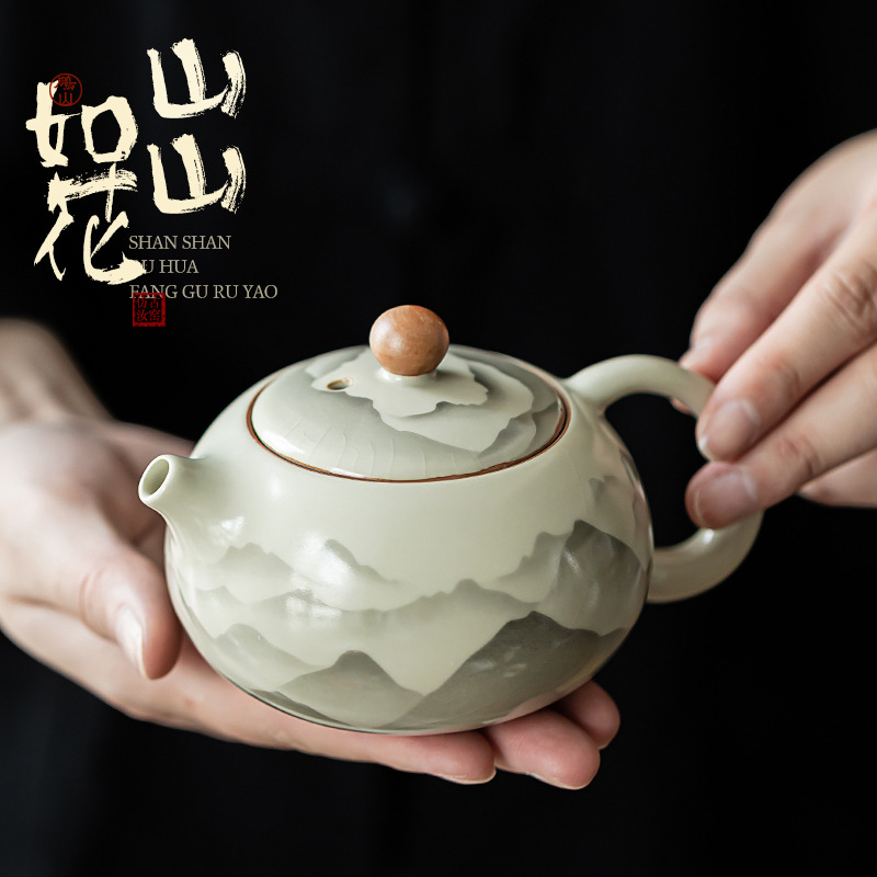 Pengshan Ruyao Mountain Ruhua Xi Shi Ấm trà gốm sứ gia dụng cổ điển Bộ trà Kung Fu Ấm trà bóng lỗ lọc Bình đơn