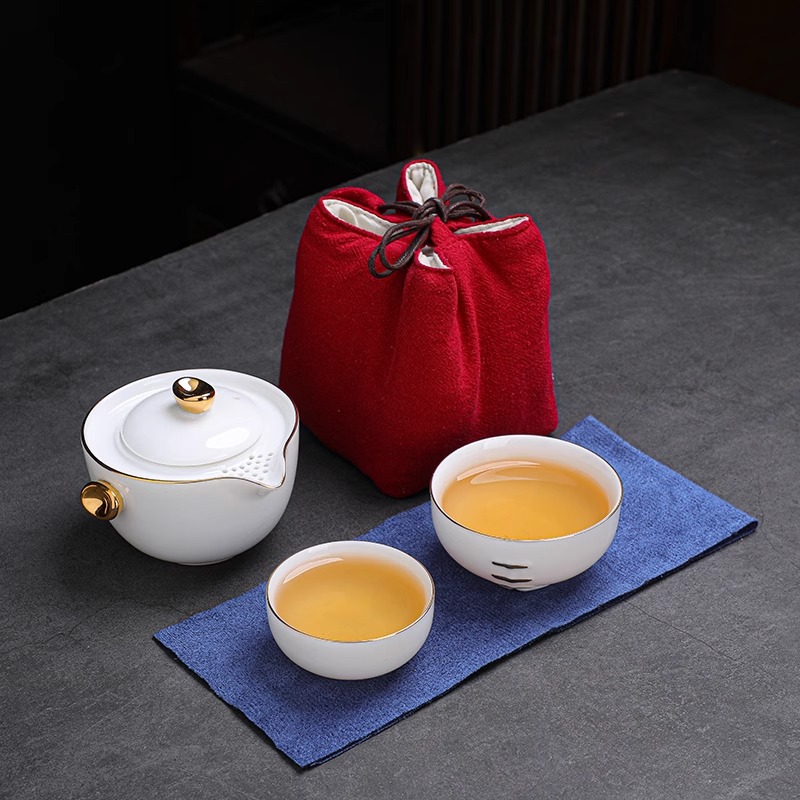 Dehua mỡ cừu ngọc Sứ ngoài trời sáng tạo di động du lịch nhanh Cốc gốm sứ một nồi Hai cốc quà tặng cao cấp trên ô tô