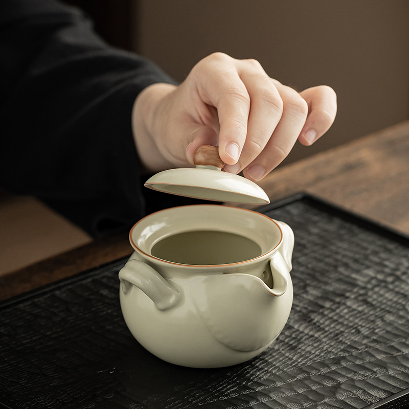 Ấm cầm tay lò Ru cổ ấm pha trà không nóng bằng gốm sứ đơn giản dụng cụ pha trà Kung Fu gia dụng có thể mở tấm ấm đơn