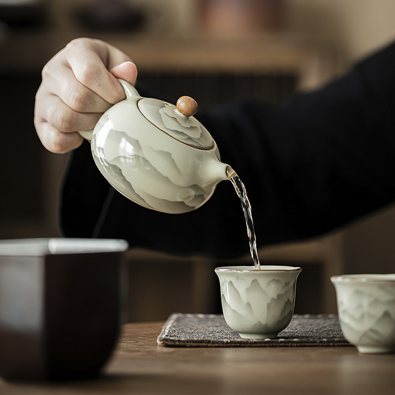 Pengshan Ruyao Mountain Ruhua Xi Shi Ấm trà gốm sứ gia dụng cổ điển Bộ trà Kung Fu Ấm trà bóng lỗ lọc Bình đơn
