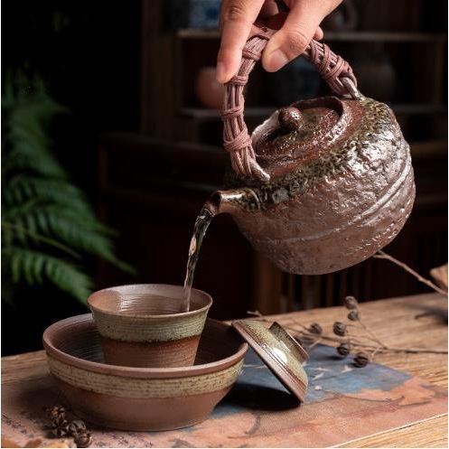 Bếp than gốm thô, bếp pha trà, nồi sắc bằng gang bên trong, nồi cầm xà, lò sưởi than cồn ngoài trời