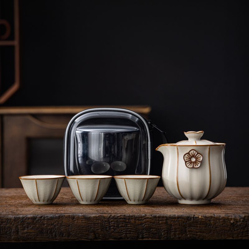 Bộ trà du lịch Daji Mi Huang Ru Kiln Bộ trà nhỏ cầm tay pha trà ngoài trời một ấm ba cốc nhanh Bộ trà Kung Fu