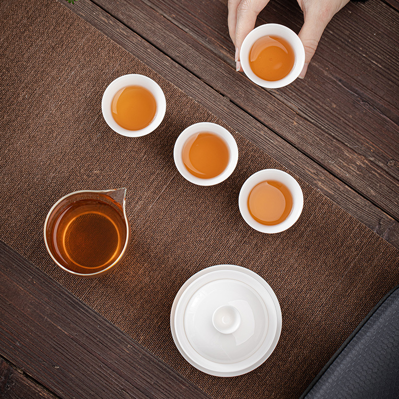 Bộ trà du lịch bằng sứ trắng ngọc bích Dehua 1 bát có nắp 4 tách trà Bộ trà Kung Fu du lịch di động ngoài trời