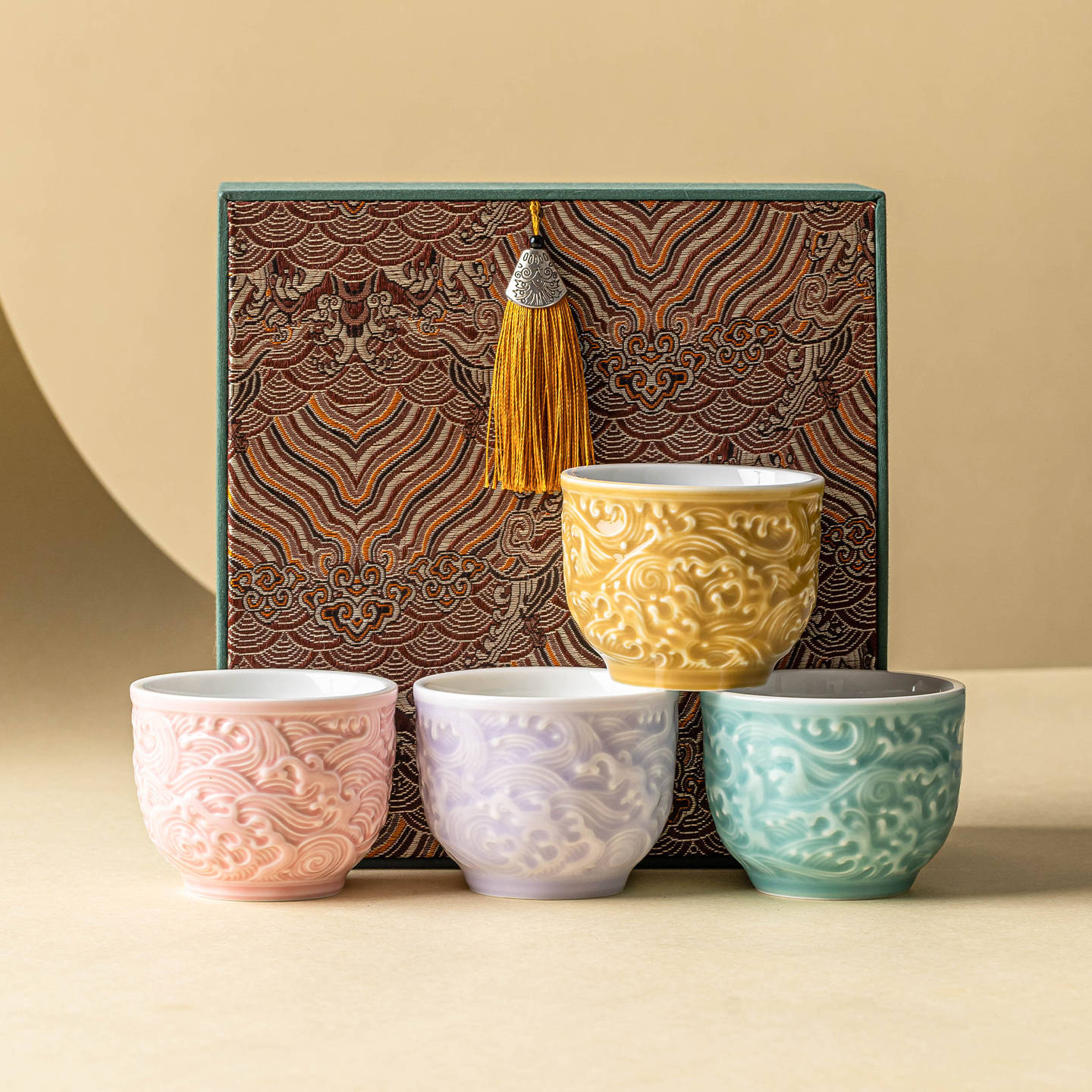 Cốc trà chạm nổi sóng Shuyun cốc chủ nhân cốc trà gốm sứ gia dụng Trung Quốc giá trị cao hộp quà chén trà tinh tế