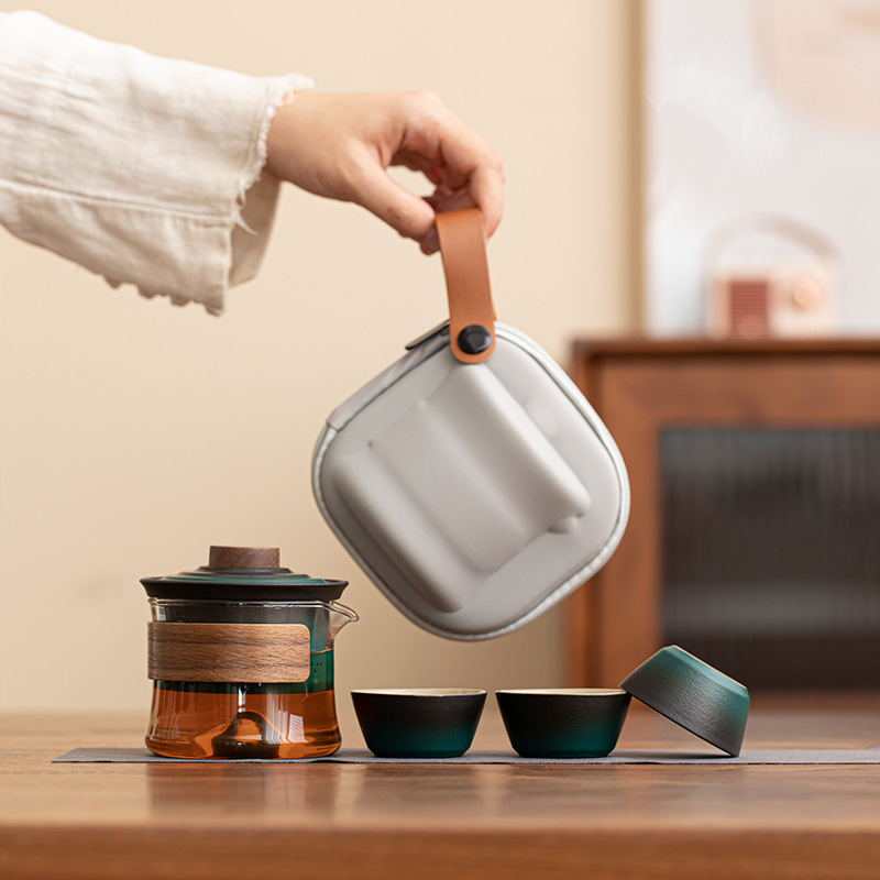 Cốc khách nhanh eo nhỏ cắm trại ngoài trời di động gốm sứ du lịch Kung Fu bộ trà một ấm ba cốc thiết bị pha trà đơn giản