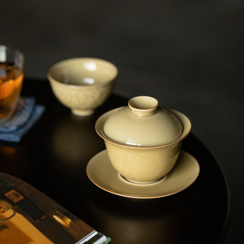 Bát có nắp ba tài phù điêu kiểu Trung Quốc Bộ trà Kung Fu gốm sứ cao cấp một chiếc bát pha trà cổ điển Dingyao không nóng tay tinh tế