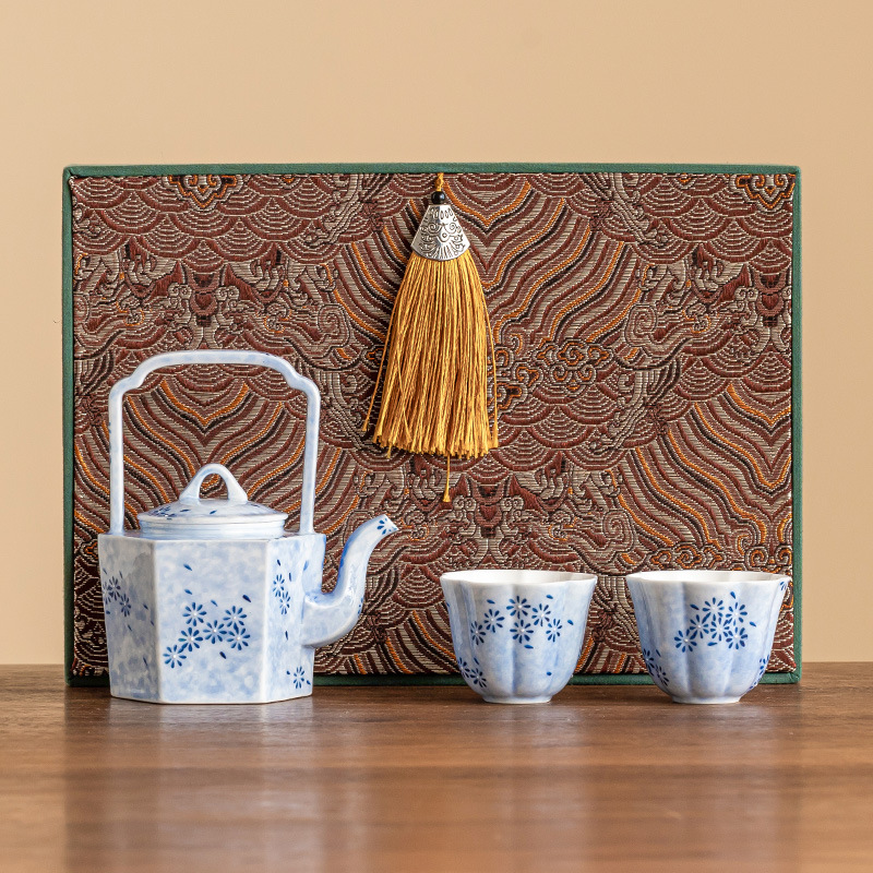 Bộ ấm trà Kung Fu hoa cúc xanh bộ ấm cầm xà chống bỏng gốm sứ cao cấp kiểu Trung Quốc mới bộ ấm hai cốc gia dụng