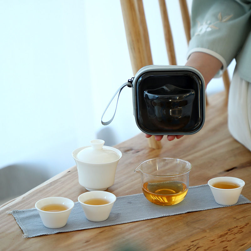 Bộ dụng cụ pha trà Kung Fu ngọc bích đựng trà gia dụng ấm pha trà cao cấp sang trọng nhẹ mẫu mới 2024 trà cốc trà có nắp sứ trắng