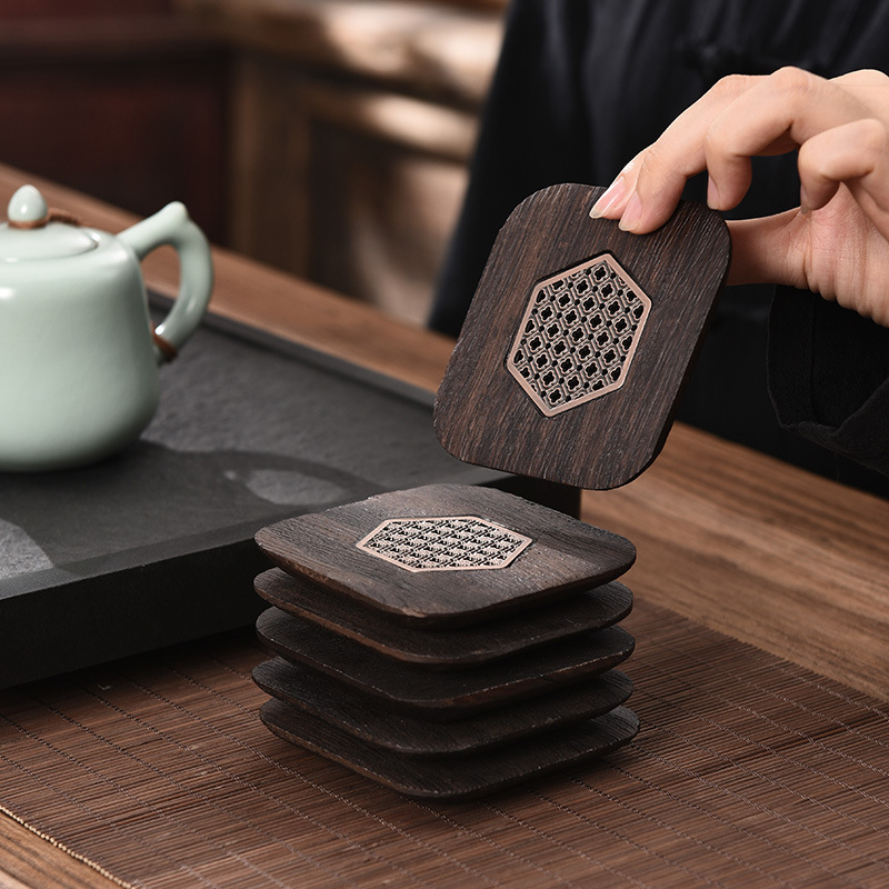 Tấm lót tách trà gỗ nguyên khối bằng gỗ mun gia dụng sáng tạo men retro phụ kiện trà đạo tấm lót cách nhiệt nhà máy bán buôn
