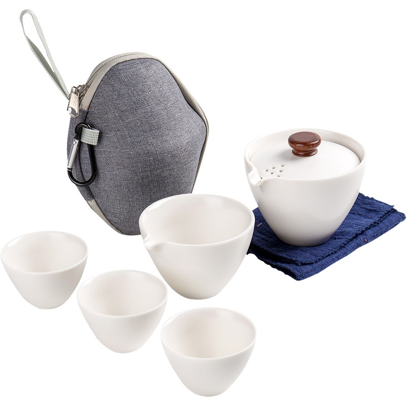 Bộ trà du lịch di động cốc khách nhanh bằng gốm Sứ đơn giản gia dụng nhỏ một ấm Ba cốc Túi xách ngoài trời trên xe
