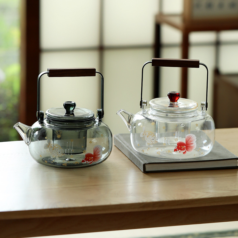 Ấm trà thủy tinh borosilicate cao, dày và chịu nhiệt độ cao, ấm pha trà gia dụng có tay cầm, thích hợp để đun nóng bếp điện gốm, ấm đun nước giữ sức khỏe.