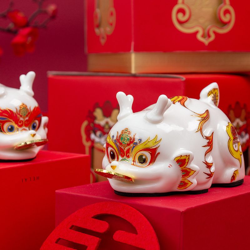 Đồ trang trí năm rồng Qian Qian Long sáng tạo Gốm con heo đất đồ trang trí con heo đất thu ngân cửa hàng khai trương quà tặng gia đình