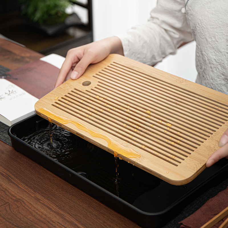 Khay trà nhỏ gia dụng thoát nước bàn trà đơn giản khay tre pha khô melamine hình chữ nhật bộ trà Kung Fu lưu trữ nước bán buôn