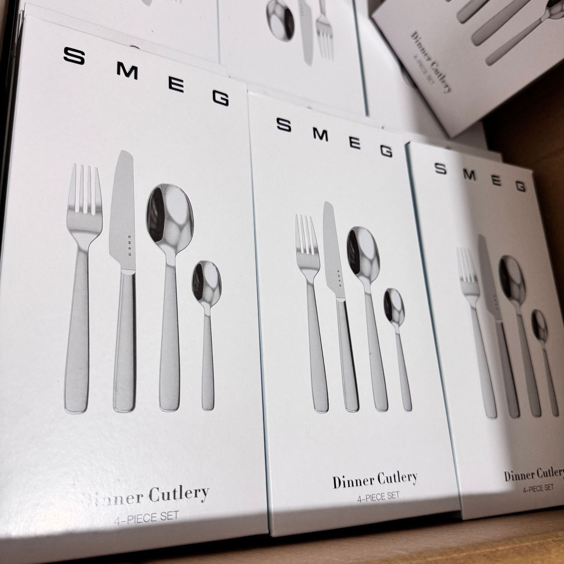 Bộ dao dĩa muỗng 4 món của SMEG thương hiệu Ý inox 304 cao cấp