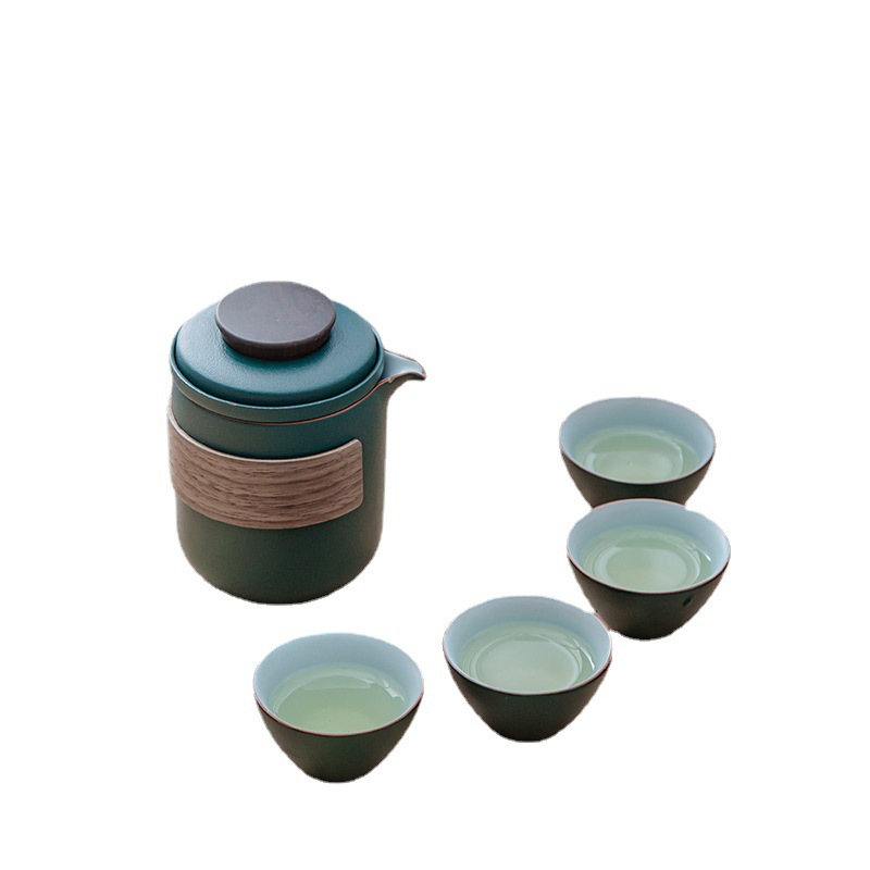 Bộ ấm trà du lịch Túi xách tay một ấm bốn Cốc gốm sứ cốc khách nhanh Kung Fu ngoài trời ấm trà cầm tay