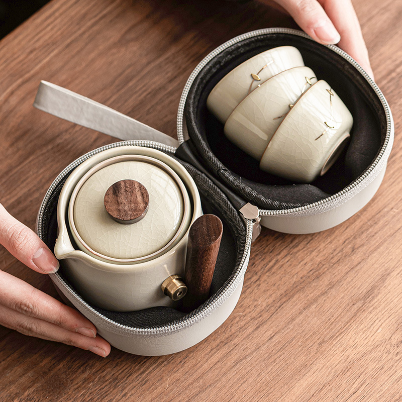 Ấm trà gốm sứ kiểu Trung Quốc ấm trà gốm sứ kiểu Trung Quốc ấm trà gia dụng ba chén ngoài trời cầm tay không nóng