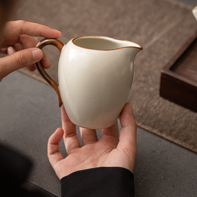 Cốc đường hầm lò Ru màu be cốc trà đồng phục gia dụng dụng dụng cụ trà Kung Fu gốm sứ cốc đơn phụ kiện dụng cụ trà có thể nâng