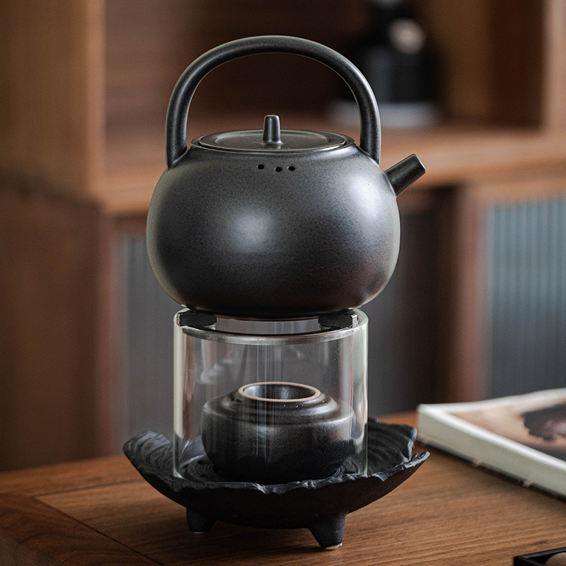 Đèn cồn thủy tinh sáng tạo bếp ấm trà bếp xung quanh bếp nấu trà đế sưởi gốm sứ ấm ấm trà pha trà cổ điển Trung Quốc