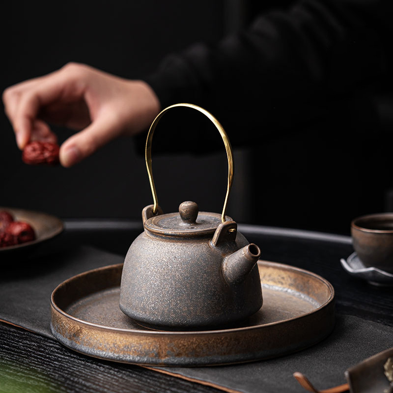 Ấm trà gốm sứ gia dụng ấm trà có dầm lọc cổ điển kiểu Trung Quốc ấm trà bộ trà công phu ấm trà ấm trà một ấm bán buôn