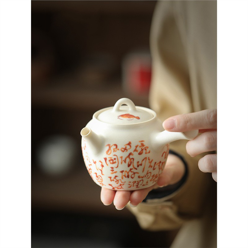Ấm pha trà bài thơ cá quế cổ điển kiểu Nhật ấm trà tráng men soda ấm trà có thể nâng bên hông ấm cầm đỏ phèn gia dụng