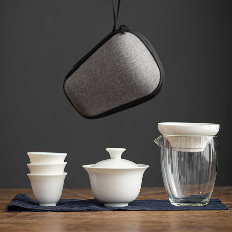 Bộ trà du lịch một ấm bốn cốc kiểu tiện lợi bát sứ trắng sứ Kungfu cốc thủy tinh nhanh Ba cốc logo ngoài trời