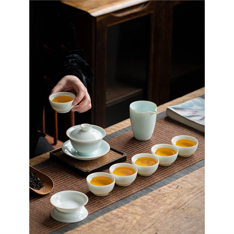 Lốp mỏng lớn có nắp ba cái bát đơn cao cấp Dehua không nóng tay bán buôn bộ trà gốm sứ Kung Fu