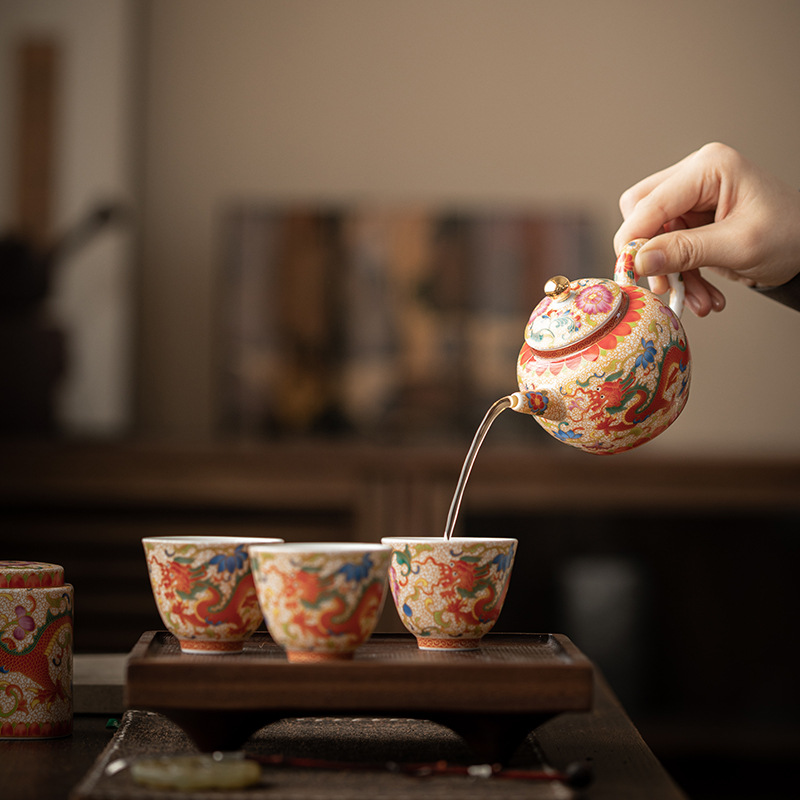 Bộ dụng cụ pha trà men rồng tốt lành quà tặng gia dụng kiểu Trung Quốc nguyên bộ dụng cụ pha trà gốm sứ ấm trà tách trà quà tặng doanh nghiệp