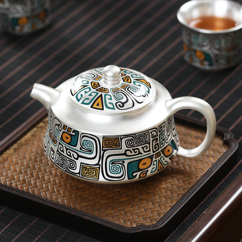 Bộ trà du lịch cầm tay cầm tay văn phòng kiểu Nhật Bản một bình bốn cốc bạc 999 sterling