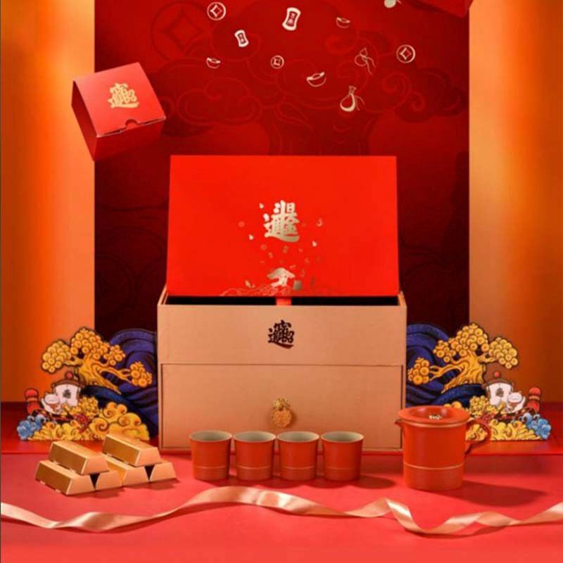 Bộ ấm trà gốm sứ năm mới Bộ ấm trà bát có nắp màu đỏ quà tặng Trung Quốc cao cấp Hộp quà văn hóa và sáng tạo gia dụng cho người lớn tuổi