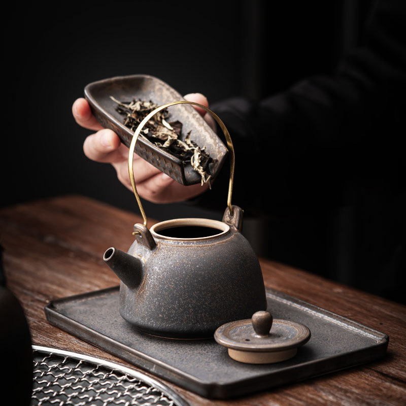 Ấm trà gốm sứ gia dụng ấm trà có dầm lọc cổ điển kiểu Trung Quốc ấm trà bộ trà công phu ấm trà ấm trà một ấm bán buôn