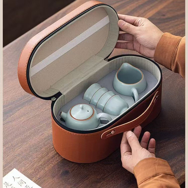 Bộ ấm trà Ru Kiln mở ra có thể nâng ấm trà sứ Ru kiểu Trung Quốc mới, một ấm bốn cốc, bộ trà du lịch Kung Fu, quà lưu niệm