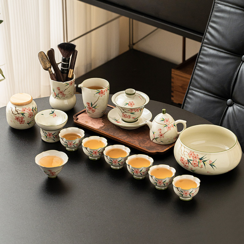 Bộ ấm chén trà hoa đào vẽ tay mẫu mới 2025 dùng cho nhà và văn phòng, chất liệu gốm sứ