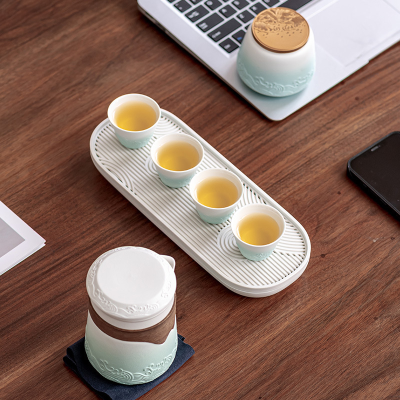 Bộ trà du lịch kiểu Nhật Bộ trà Kung Fu một ấm bốn cốc cốc khách nhanh ngoài trời cao cấp hiện đại đơn giản xách tay