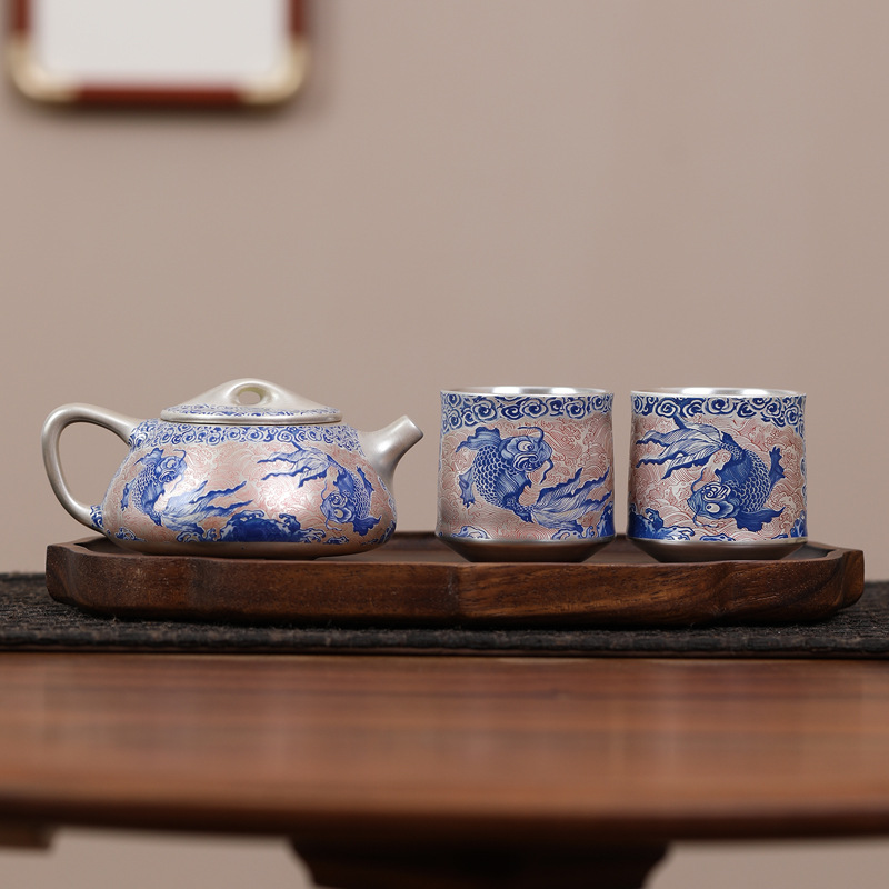 Bộ ấm chén trà Kung Fu hình cá mạ bạc, dùng trong nhà, gốm sứ cao cấp nhẹ nhàng sang trọng, gồm 1 ấm và 2 chén.