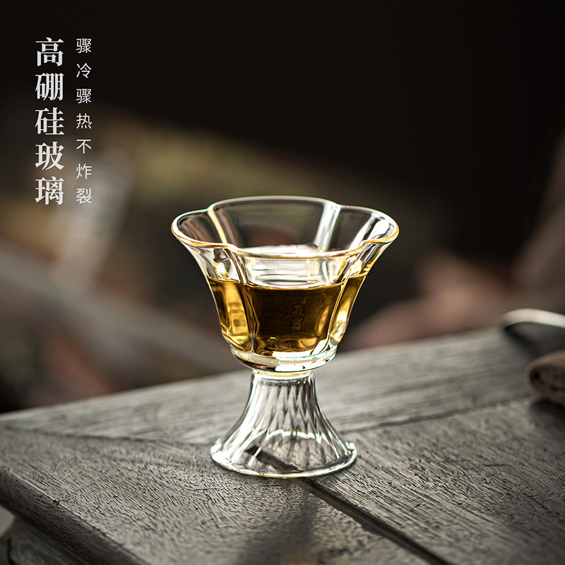 Cốc thủy tinh có độ cao borosilicate hoa văn đáy quay cốc cao cốc chủ sở hữu bộ trà Kung Fu chịu nhiệt gia dụng cốc trà dùng cho bé gái