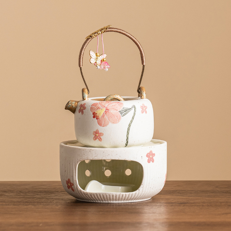 Quạt chạm khắc hình hoa chuông bếp ấm trà gốm sứ nến cồn nấu trà bếp đun trà dụng cụ đun trà chân đế đun ấm trà