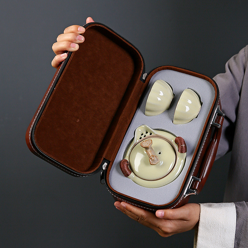 Bộ trà du lịch Ruyao cốc khách nhanh đơn giản cao cấp cầm tay pha trà ngoài trời một bình hai cốc bộ bốn cốc