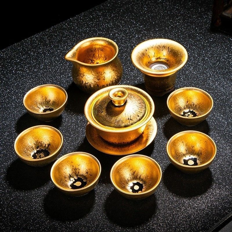 Bộ ấm trà Kiến Dương Kiến Trang bát có nắp mạ vàng 24K thủ công gia dụng giọt dầu bào sắt cốc trà vàng hộp quà cao cấp