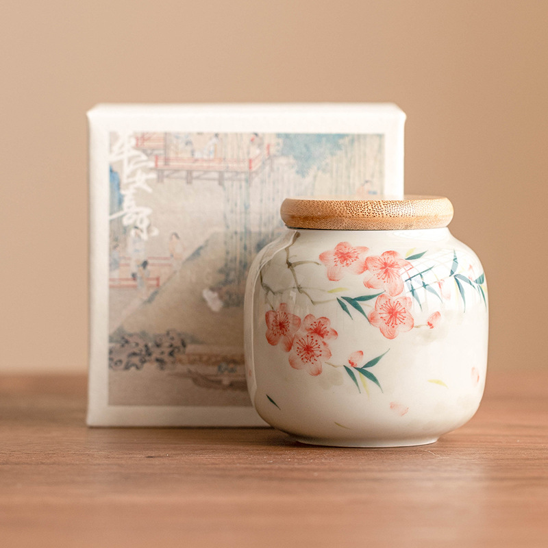 Bể trà ba nhân dân tệ hoa đào vẽ tay, bể kín, bể chứa trà cầm tay chống ẩm, bể chứa, bộ trà đơn gốm sứ