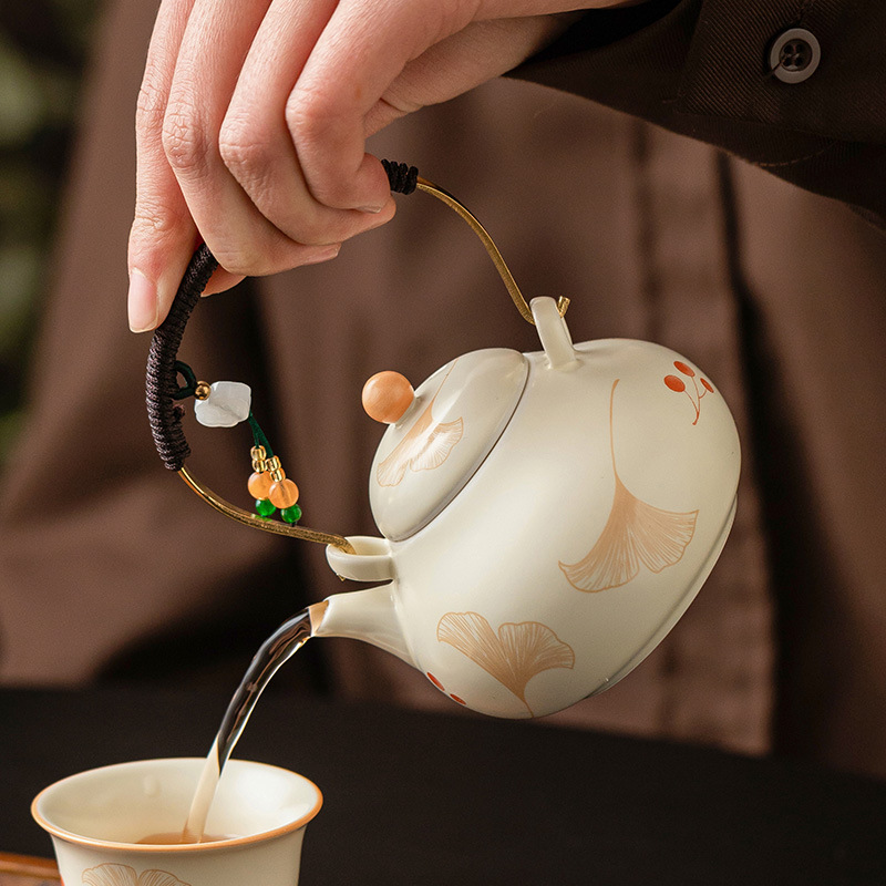 Ấm trà chùm dây buộc bạch quả màu be ấm trà gốm sứ pha trà dụng cụ trà kungfu gia dụng lọc ấm trà đơn ấm trà nhỏ kiểu Trung Quốc