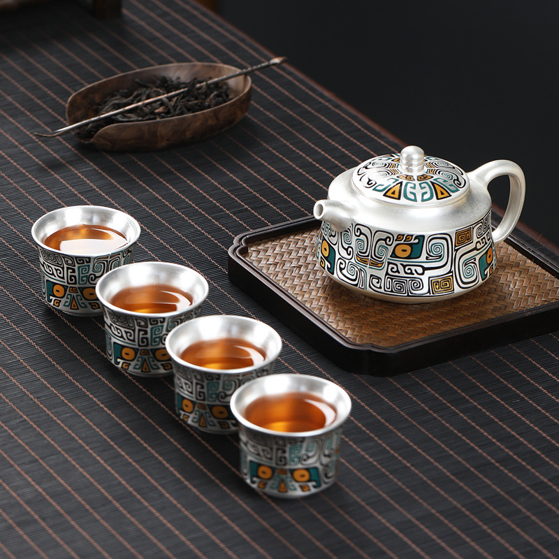 Bộ trà du lịch cầm tay cầm tay văn phòng kiểu Nhật Bản một bình bốn cốc bạc 999 sterling